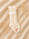 Calzino panna traforato con fiocco grosgrain Condr.