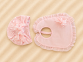 Turbante e bavetta rosa con fiori